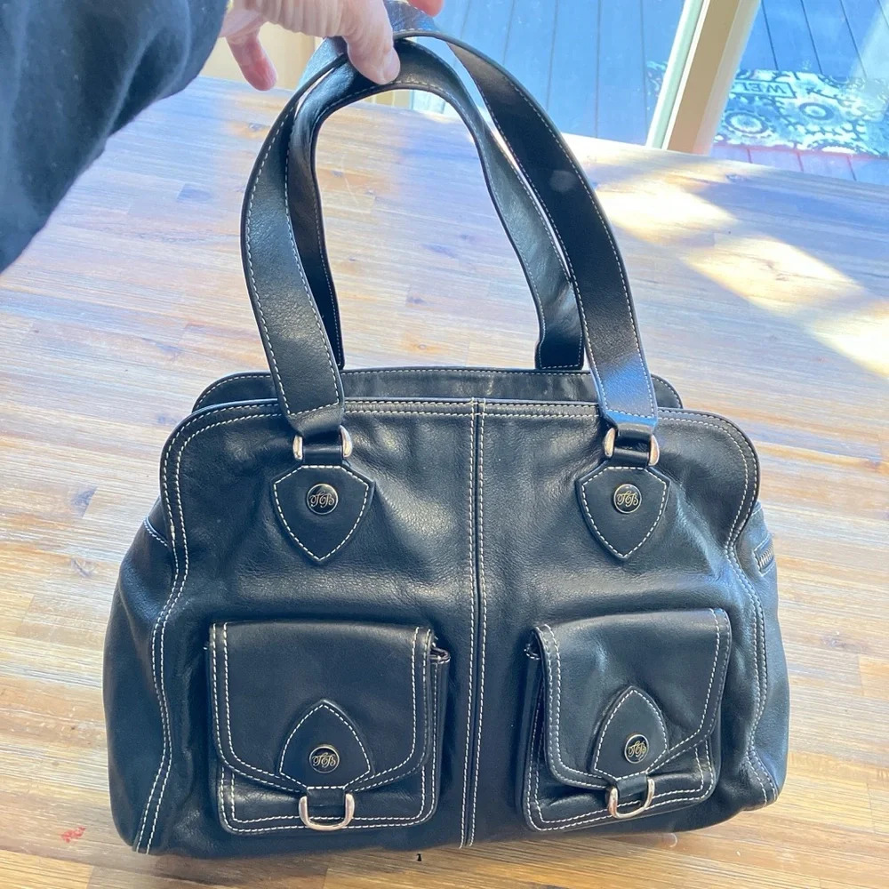Ted Baker black leather satchel bag with white‎ stitching. Excellent condition.